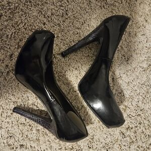 Black patent stilletos with purple heels